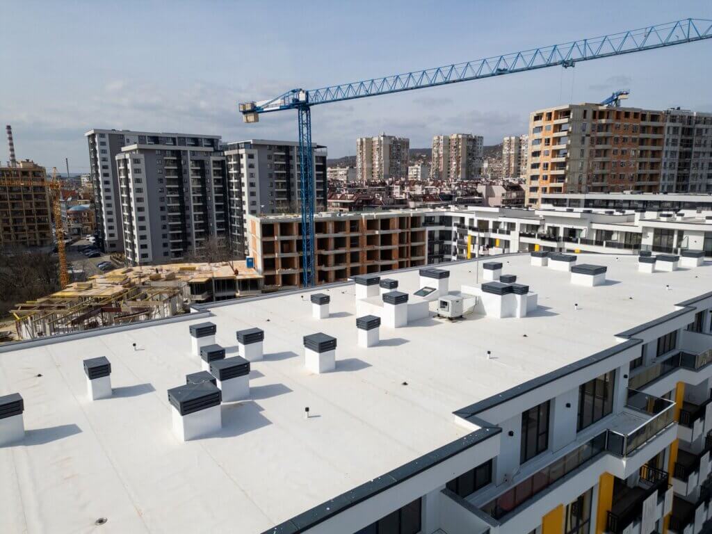 View of the top of a roof on a commercial building | commercial flat roof systems