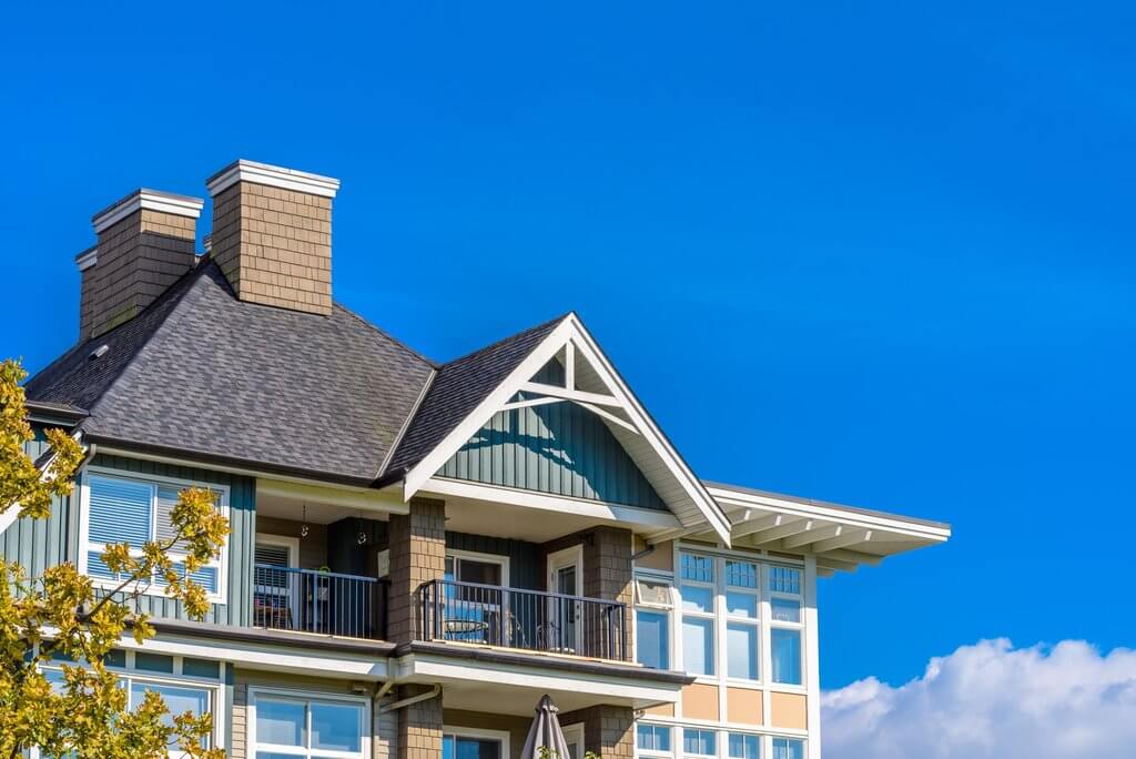 Picture of the top half of an apartment complex 